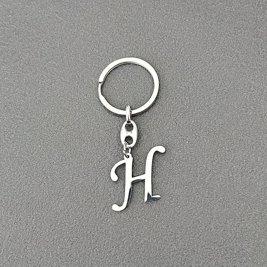 1pc Fashionable Stainless Steel 26-Letter Keychain - The Perfect Choice for Men's Backpacks and Car Accessories, Minimalist Pendant