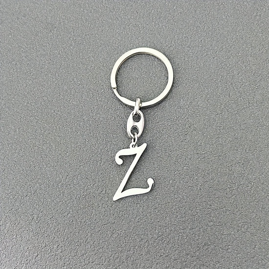 1pc Fashionable Stainless Steel 26-Letter Keychain - The Perfect Choice for Men's Backpacks and Car Accessories, Minimalist Pendant