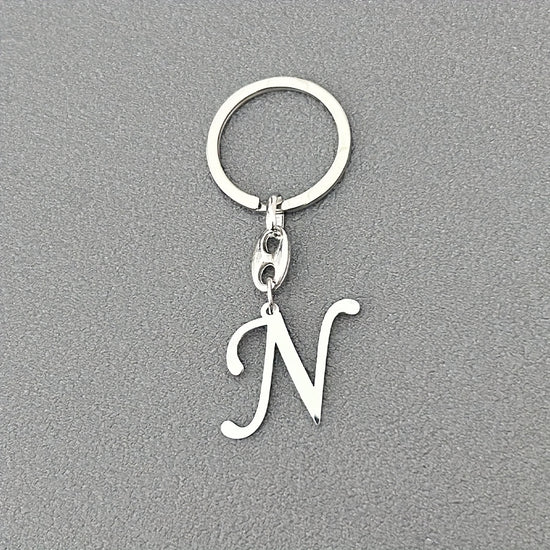 1pc Fashionable Stainless Steel 26-Letter Keychain - The Perfect Choice for Men's Backpacks and Car Accessories, Minimalist Pendant