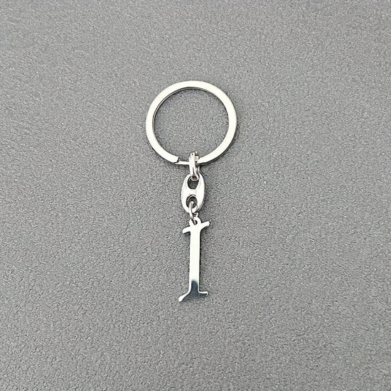 1pc Fashionable Stainless Steel 26-Letter Keychain - The Perfect Choice for Men's Backpacks and Car Accessories, Minimalist Pendant