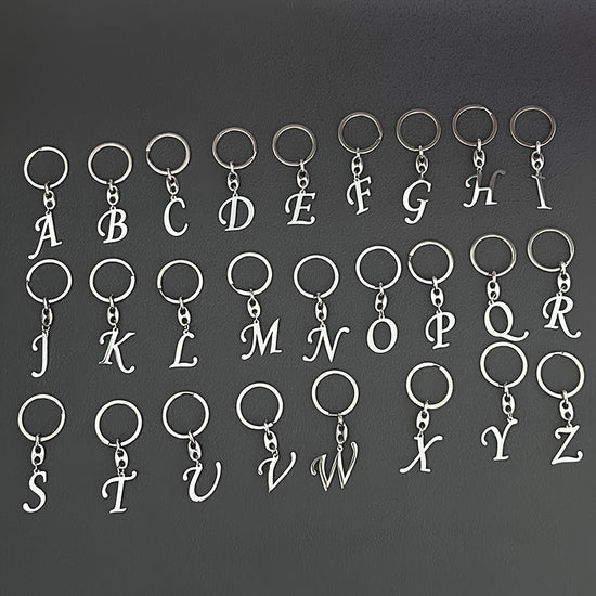 1pc Fashionable Stainless Steel 26-Letter Keychain - The Perfect Choice for Men's Backpacks and Car Accessories, Minimalist Pendant