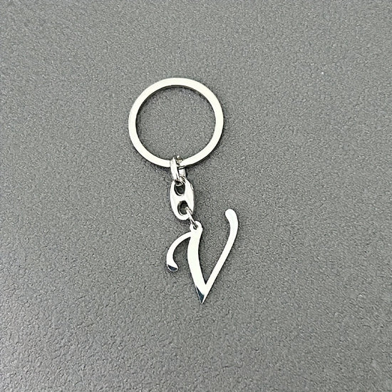 1pc Fashionable Stainless Steel 26-Letter Keychain - The Perfect Choice for Men's Backpacks and Car Accessories, Minimalist Pendant