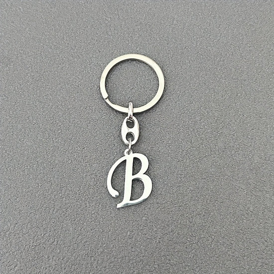 1pc Fashionable Stainless Steel 26-Letter Keychain - The Perfect Choice for Men's Backpacks and Car Accessories, Minimalist Pendant