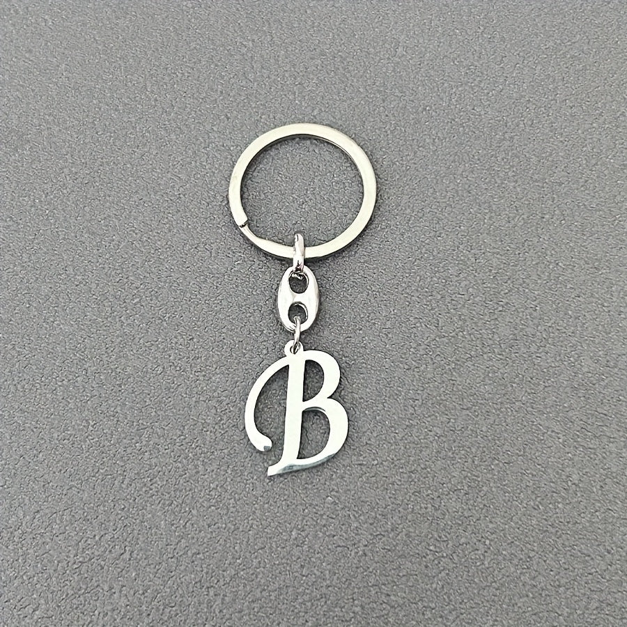 1pc Fashionable Stainless Steel 26-Letter Keychain - The Perfect Choice for Men's Backpacks and Car Accessories, Minimalist Pendant