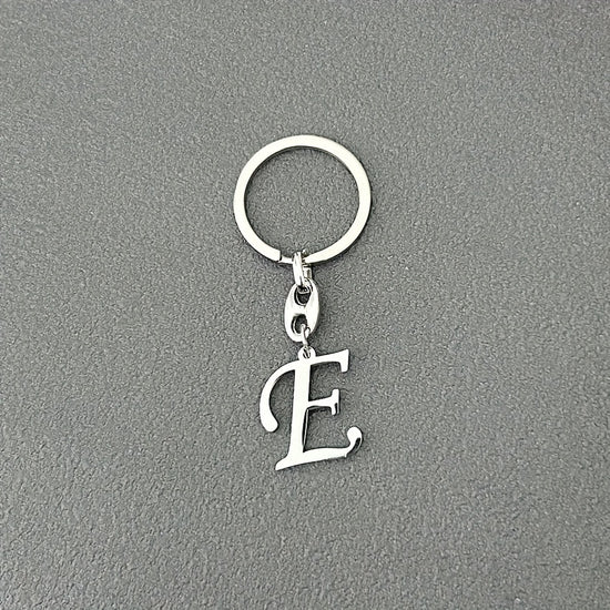 1pc Fashionable Stainless Steel 26-Letter Keychain - The Perfect Choice for Men's Backpacks and Car Accessories, Minimalist Pendant