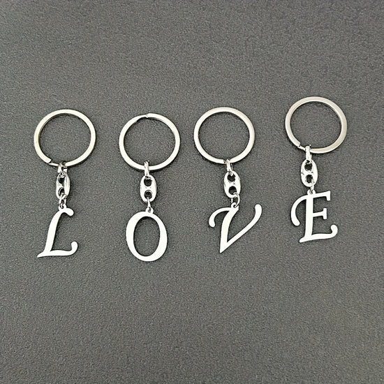1pc Fashionable Stainless Steel 26-Letter Keychain - The Perfect Choice for Men's Backpacks and Car Accessories, Minimalist Pendant