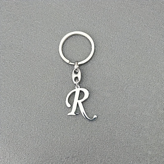 1pc Fashionable Stainless Steel 26-Letter Keychain - The Perfect Choice for Men's Backpacks and Car Accessories, Minimalist Pendant